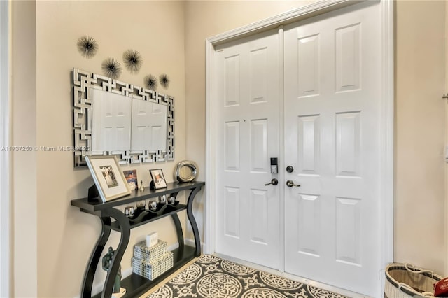 entryway featuring tile patterned flooring