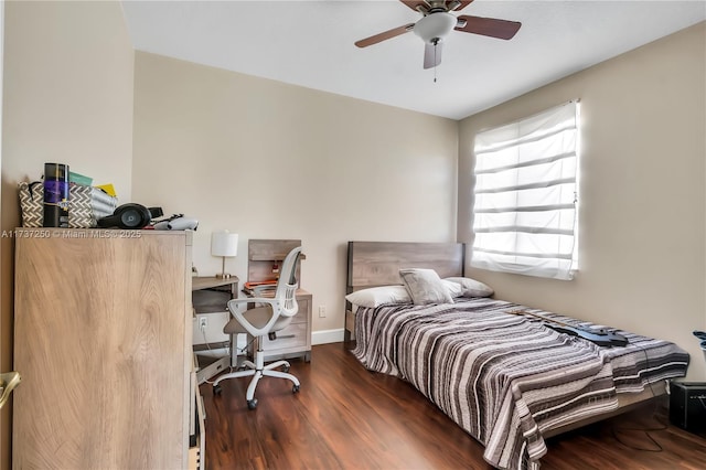 bedroom featuring dark hardwood / wood-style floors and ceiling fan