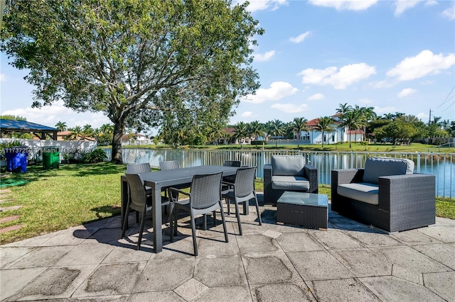 view of patio / terrace with a water view