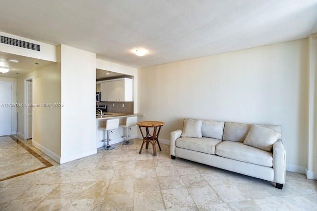 living room with sink