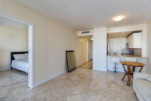 living room featuring sink