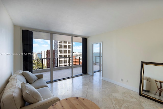 living room with a wall of windows