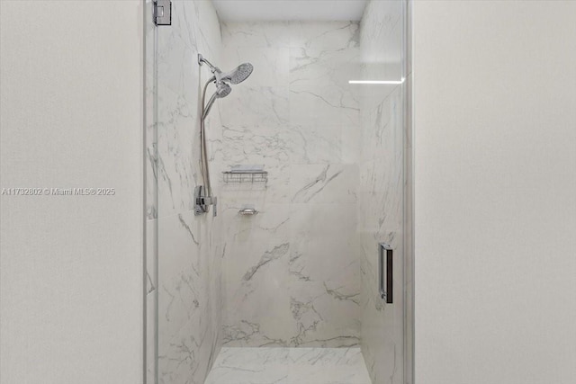 bathroom with an enclosed shower