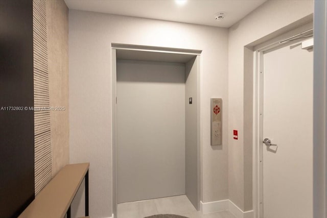 bathroom featuring elevator