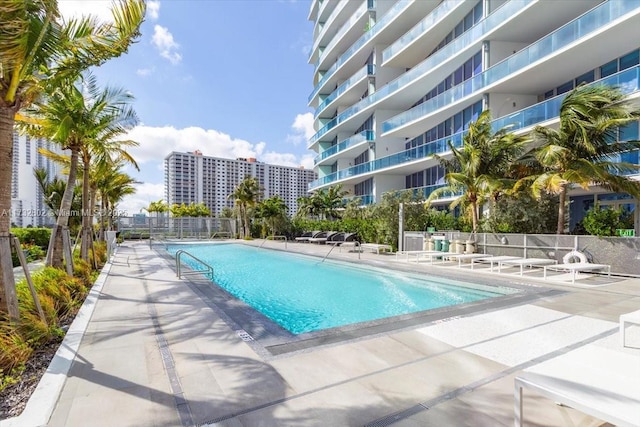 view of swimming pool featuring a patio