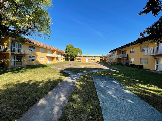 view of community with a lawn