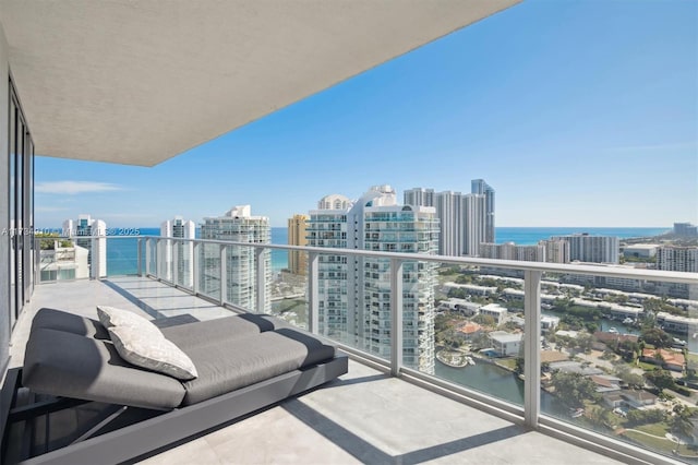 balcony featuring a water view