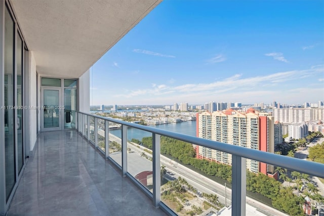 balcony featuring a water view