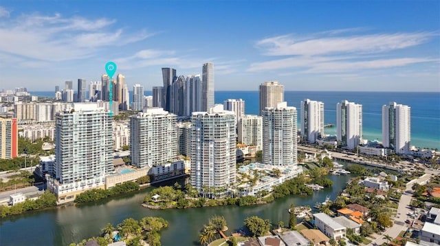 property's view of city with a water view