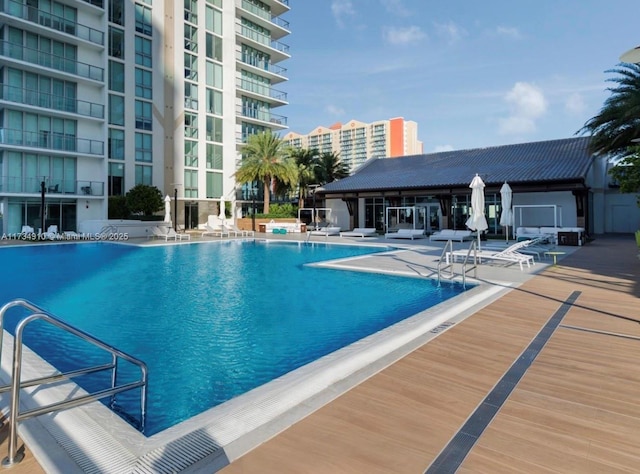 view of swimming pool with a patio