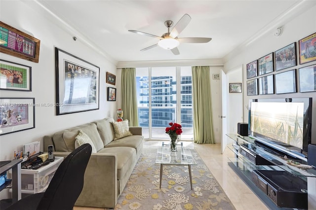 living room featuring expansive windows, ceiling fan, and ornamental molding