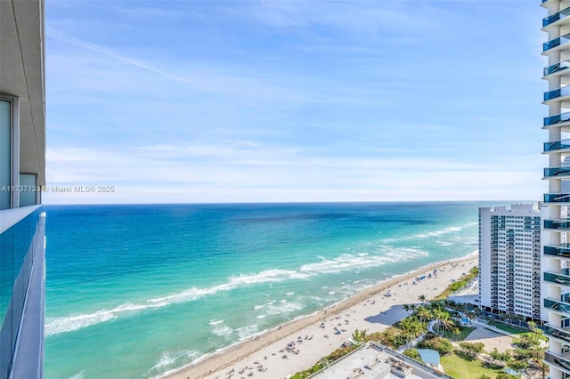 property view of water featuring a beach view