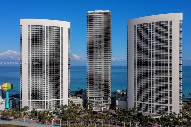 view of property with a water view