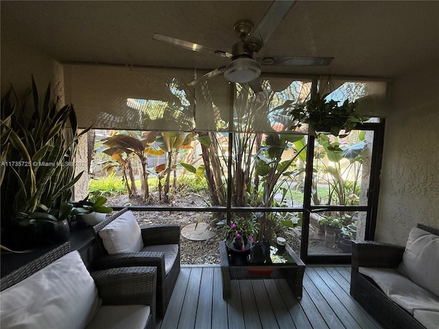 sunroom / solarium with ceiling fan