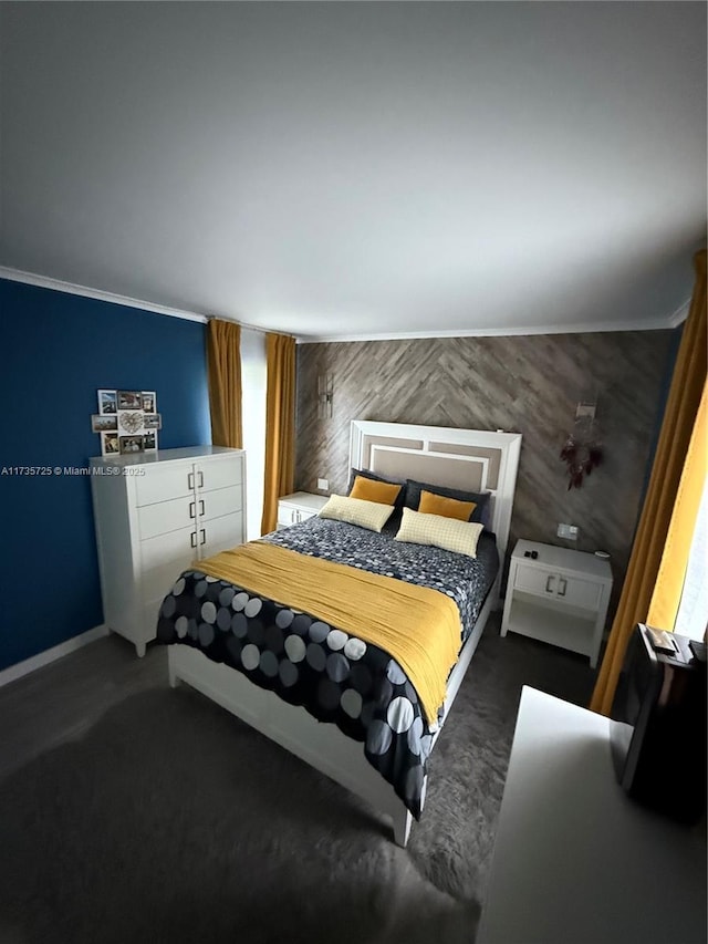 carpeted bedroom featuring crown molding