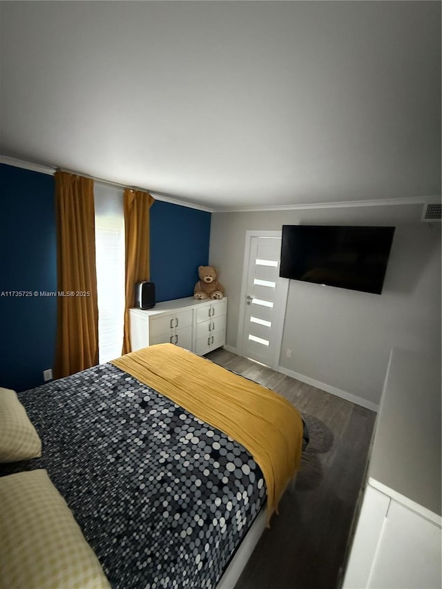 bedroom featuring hardwood / wood-style flooring