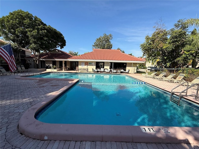 view of pool featuring a patio area