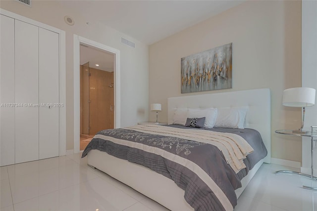 bedroom featuring light tile patterned floors