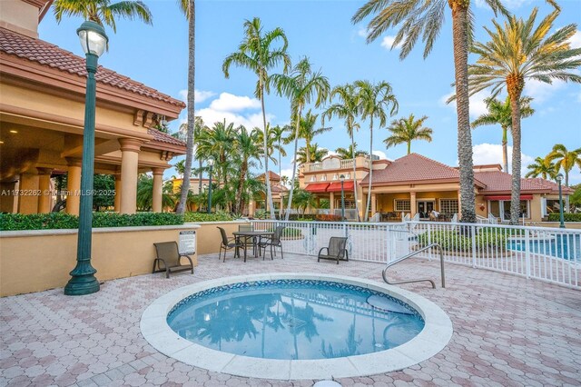 view of swimming pool featuring a patio