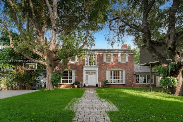 view of front of home with a front yard