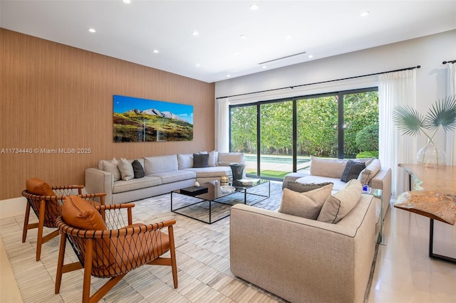 living room featuring plenty of natural light