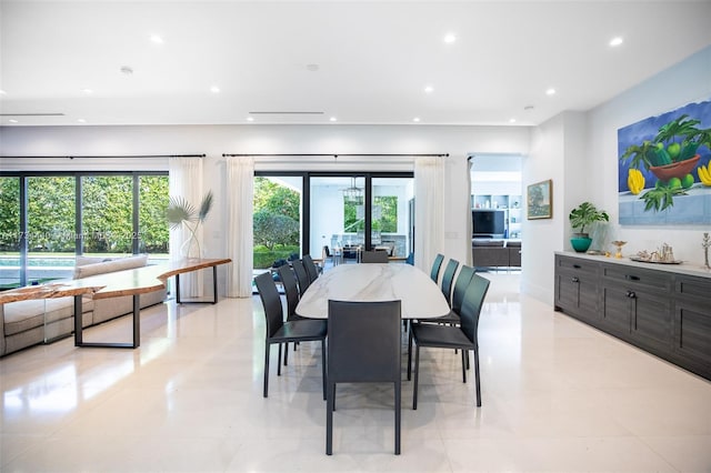 dining space with light tile patterned flooring