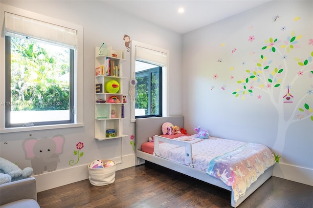 bedroom featuring dark hardwood / wood-style floors