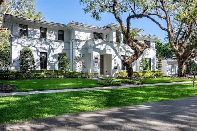 view of front of house with a front lawn