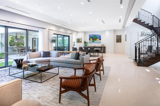 living room featuring light tile patterned flooring