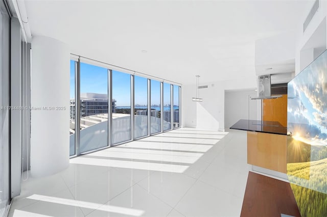 tiled empty room with expansive windows