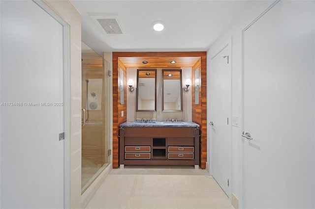 corridor featuring light tile patterned flooring