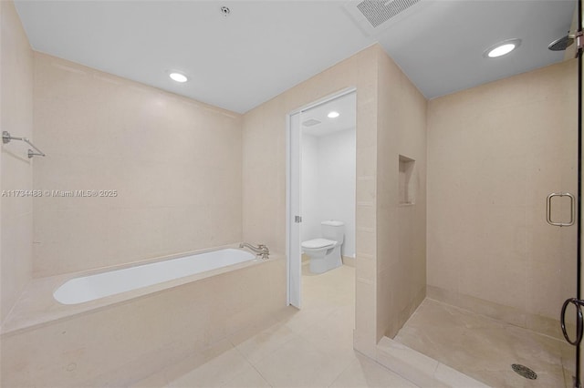 bathroom with separate shower and tub, tile patterned floors, and toilet