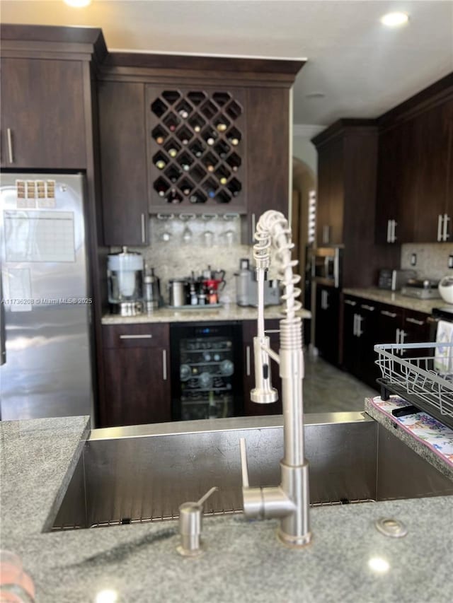 8654 W 33rd Ave, Hialeah, FL 33018 - indoor dry bar featuring stainless steel refrigerator and beverage cooler