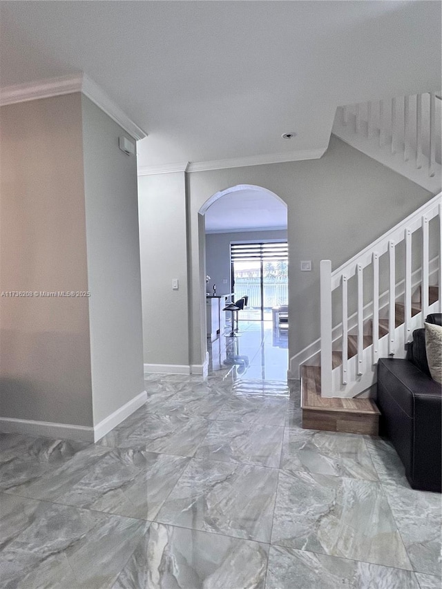 8654 W 33rd Ave, Hialeah, FL 33018 - stairway with ornamental molding, arched walkways, baseboards, and marble finish floors