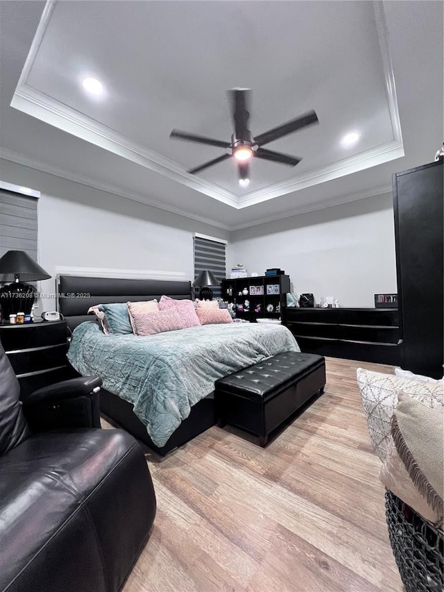 8654 W 33rd Ave, Hialeah, FL 33018 - bedroom with a tray ceiling, ornamental molding, light wood finished floors, ceiling fan, and recessed lighting