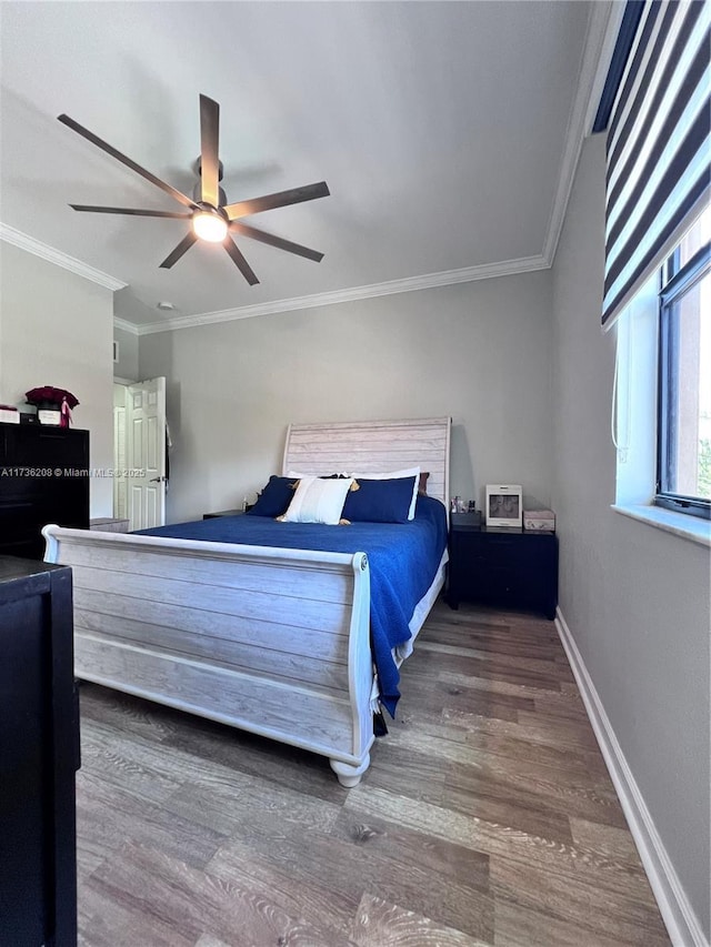 8654 W 33rd Ave, Hialeah, FL 33018 - bedroom with crown molding, wood finished floors, baseboards, and ceiling fan
