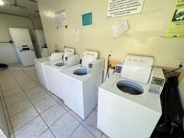 washroom with light tile patterned flooring, stacked washer and clothes dryer, and separate washer and dryer