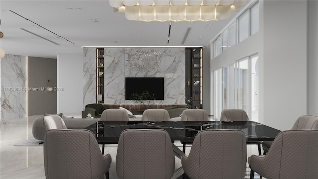 dining room with tile walls and a high end fireplace