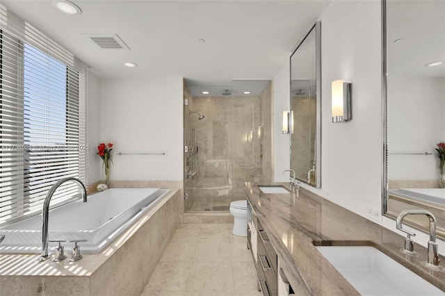 full bathroom featuring vanity, tile patterned floors, plus walk in shower, and toilet