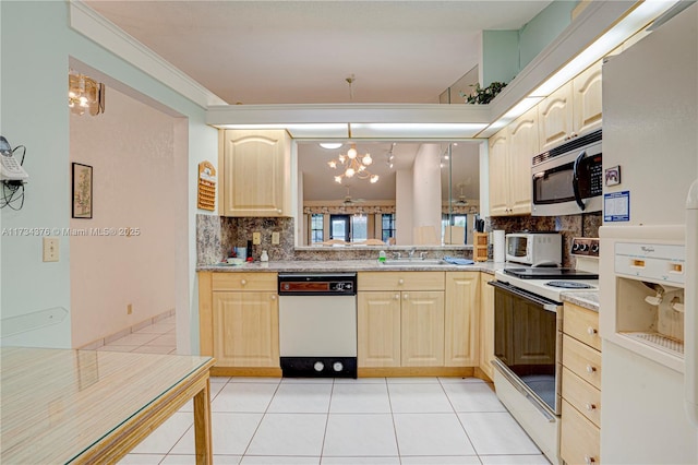 kitchen with white appliances, light brown cabinetry, sink, and light tile patterned floors