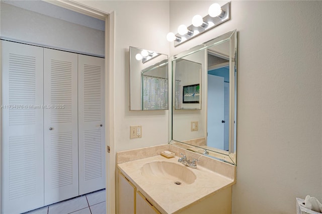 bathroom featuring vanity and tile patterned flooring