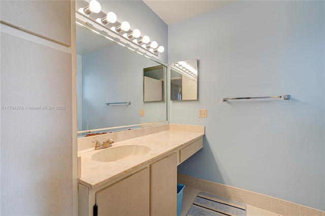 bathroom featuring vanity and tile patterned flooring