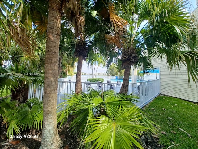 view of yard with a community pool