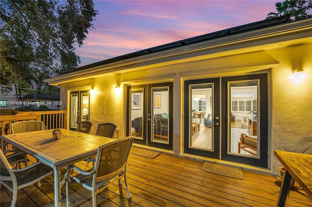 view of deck at dusk