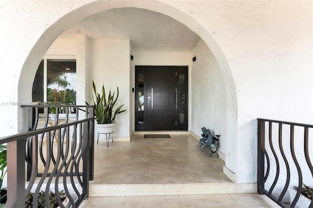 property entrance with a balcony