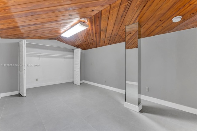 bonus room featuring lofted ceiling, baseboards, and wooden ceiling