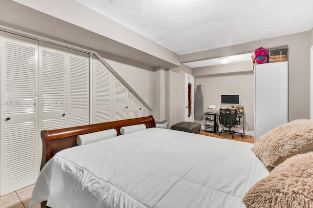 bedroom featuring a textured ceiling