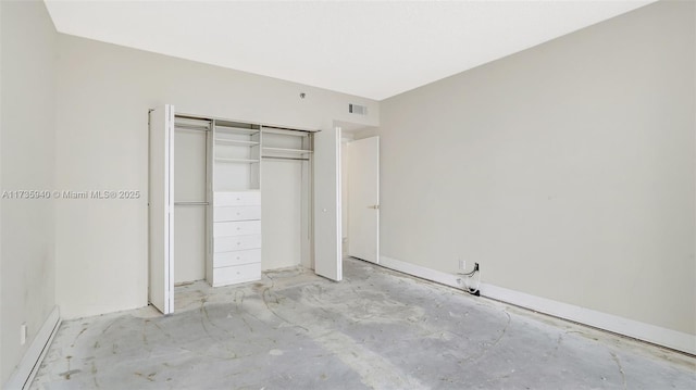 unfurnished bedroom with a closet