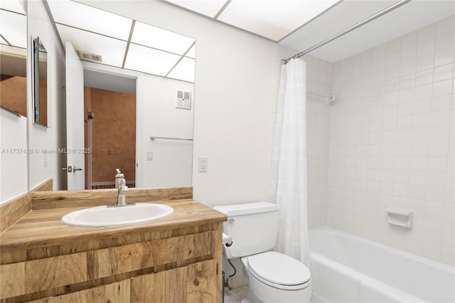 full bathroom featuring vanity, toilet, and shower / bath combo with shower curtain