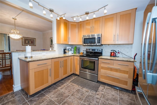 kitchen featuring stainless steel appliances, kitchen peninsula, and light brown cabinets